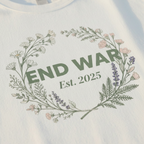 White t-shirt with End War floral wreath and Est. 2025 print