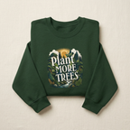 Forest green unisex sweatshirt with “Plant More Trees” graphic, front view on fabric.