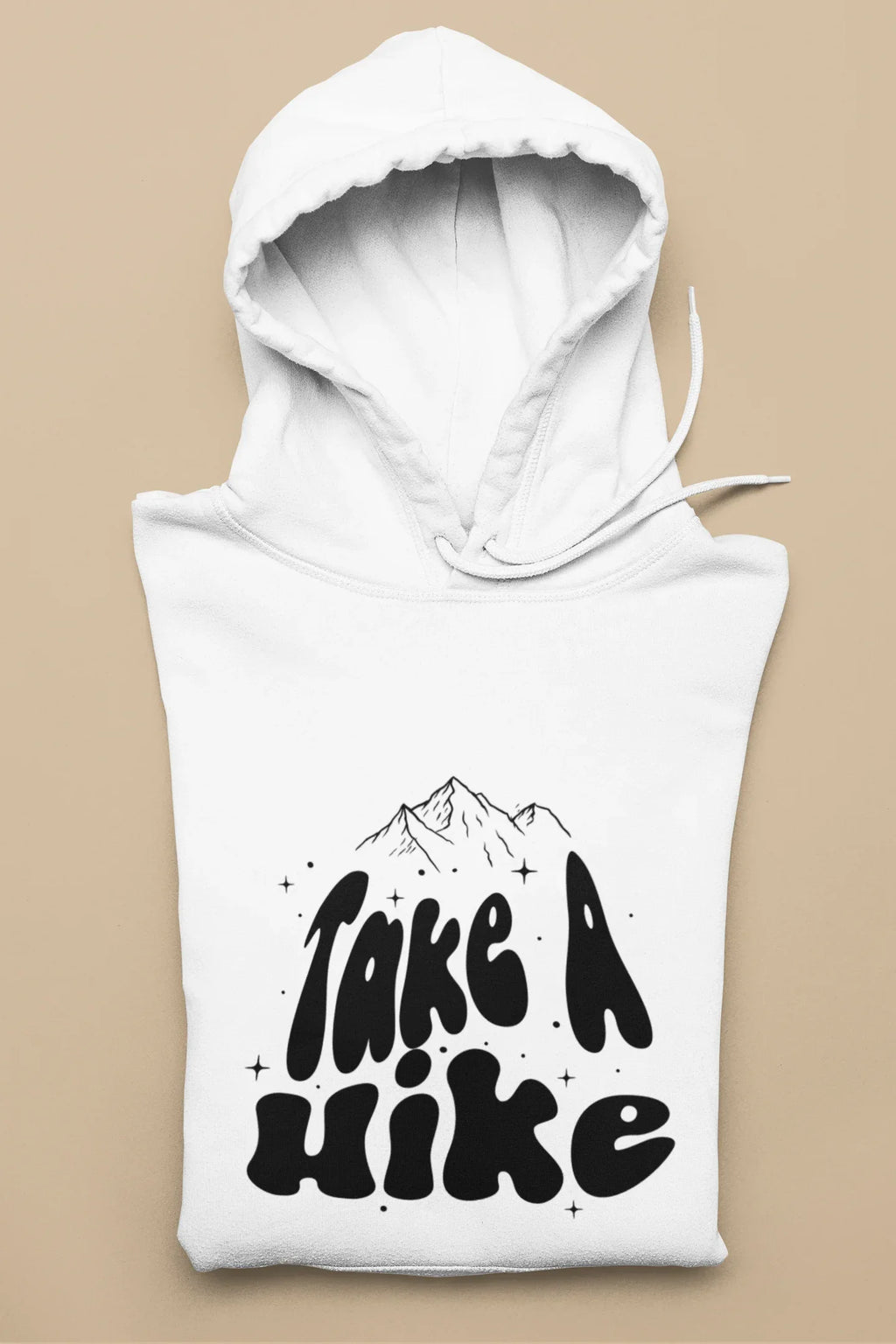 White hoodie with hood and front Take a Hike mountain graphic, laid flat.