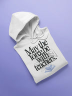 White hooded sweatshirt, graphic print on chest with blue book emblem.