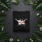 Black pullover hoodie with drawstring hood and couple graphic on front
