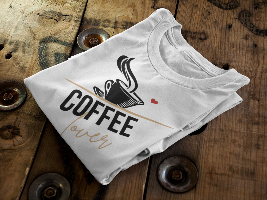 Folded white unisex cotton T-shirt with coffee cup graphic and gold script across front
