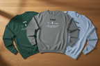 Crewneck sweatshirt trio in green, gray, and light blue with personalized names and outdoor graphic.