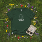 Forest green unisex T-shirt with 'unplug to recharge' phone and floral graphic