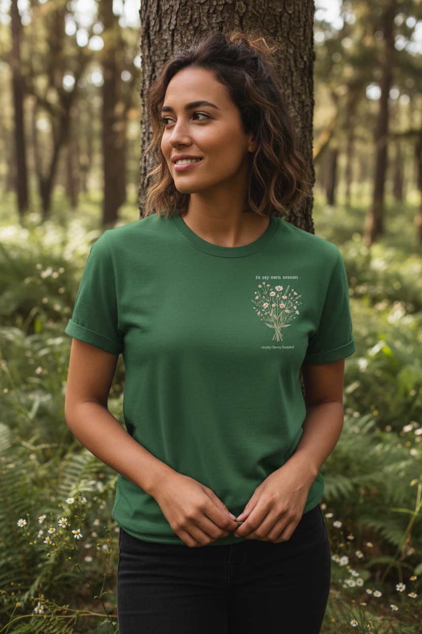 Personalised forest green t-shirt with small floral tree graphic and "In my own season" text