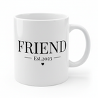White mug with bold "FRIEND" text, "Est.2023" line, and heart icon