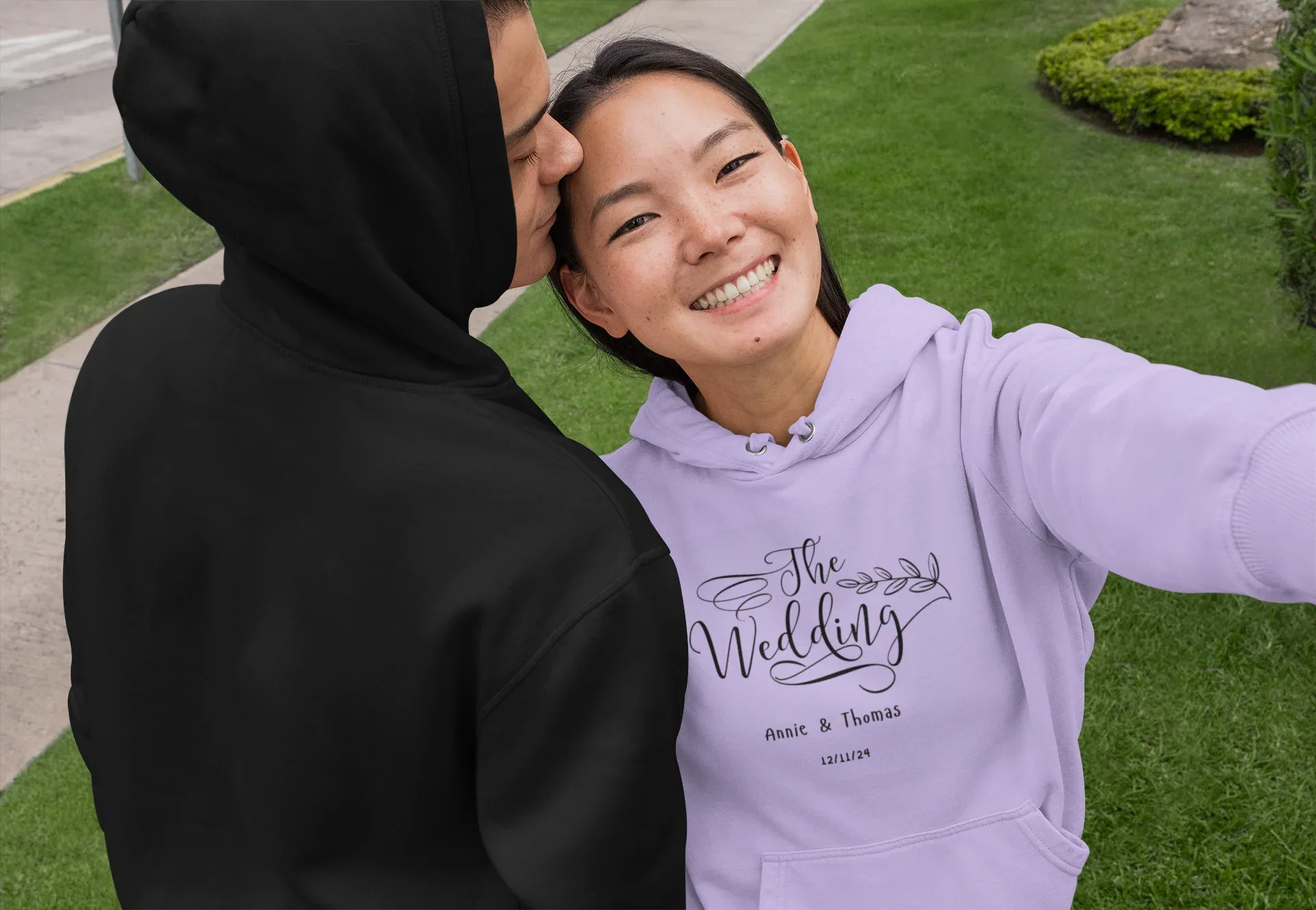 Lavender wedding day hoodie sweatshirt with front “The Wedding” logo and hood