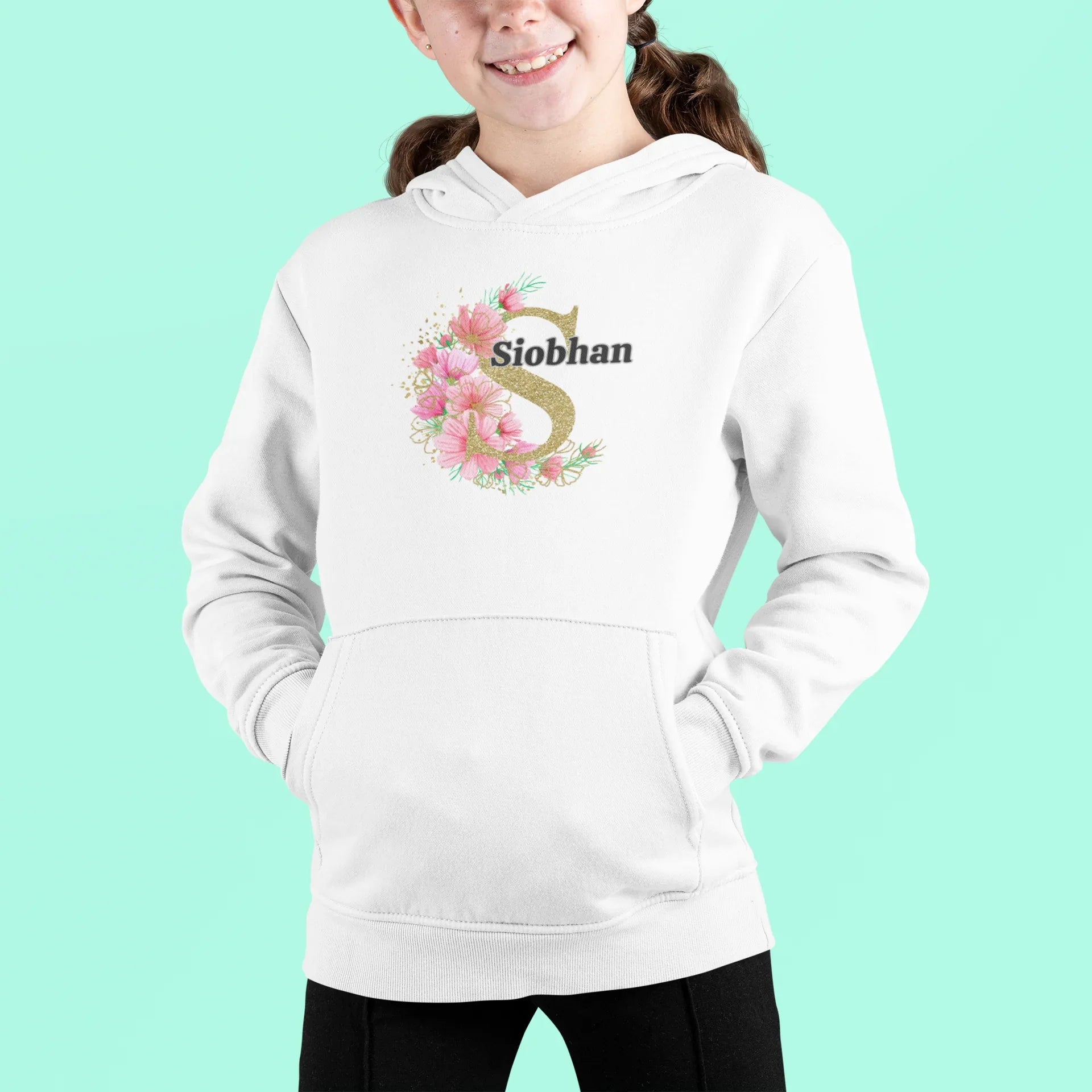 White kids hoodie with hood and front pocket, floral letter Siobhan graphic