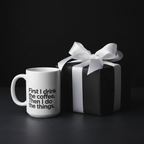 White ceramic coffee mug with black quote: First I drink the coffee, then I do the things.