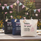Set of three cotton tote bags: black, navy, and white, each with birthday print.