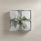 Light sweatshirt in a gift box with green ribbon, featuring a woodland animal graphic