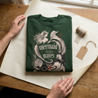 Unisex forest green sweatshirt, front mermaid “make waves” graphic