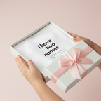 White Mama T-shirt in gift box with pink ribbon bow and “I have two names” print