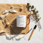 White ceramic mug with red handle and printed friendship quote and names.