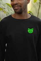 Black long-sleeve sweatshirt with green frog face embroidery on the left chest