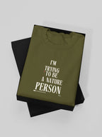 Olive green sweatshirt with 'I'm Trying to Be a Nature Person' slogan