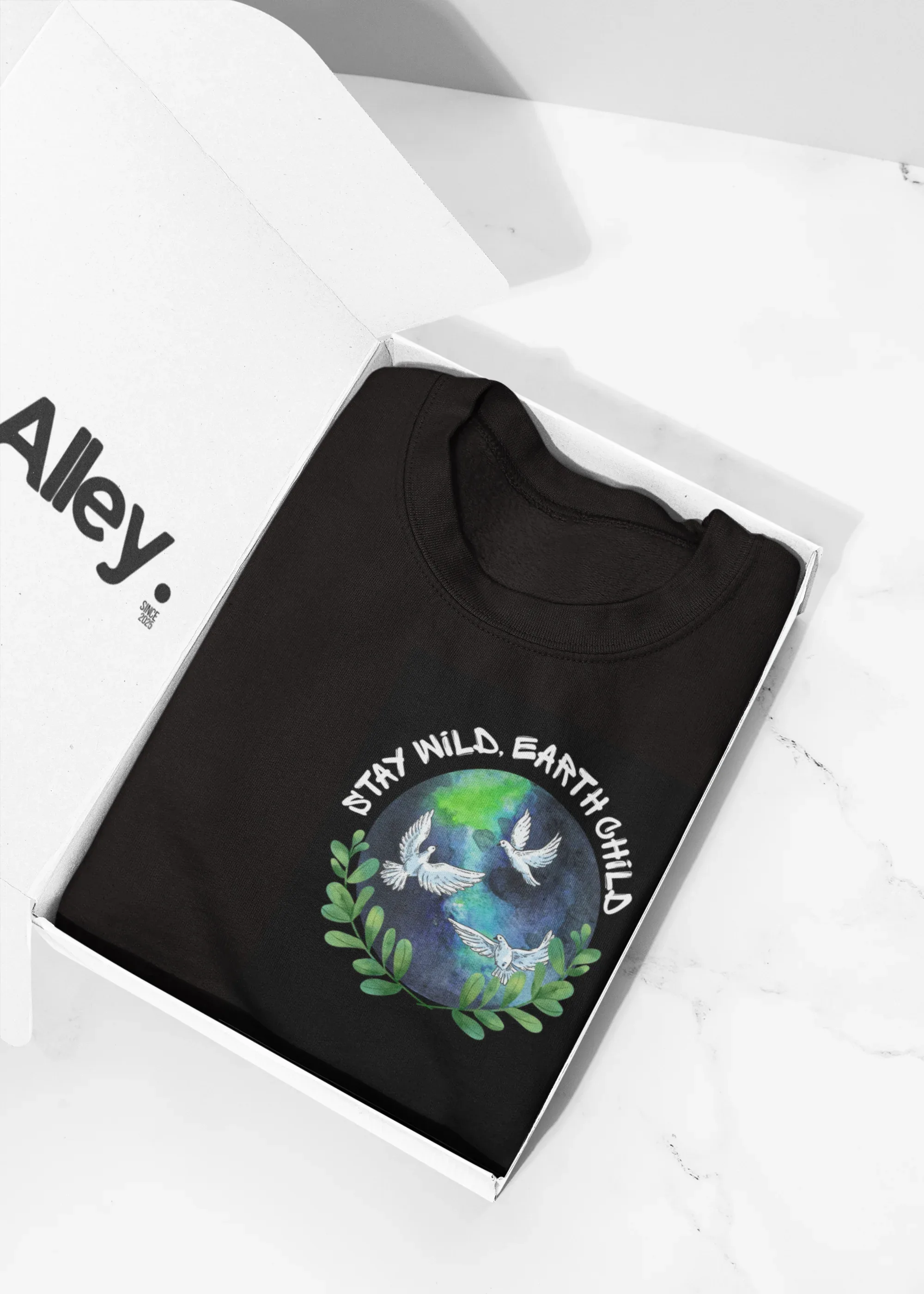 Black crewneck sweatshirt with a circular dove and leaf nature graphic on chest.