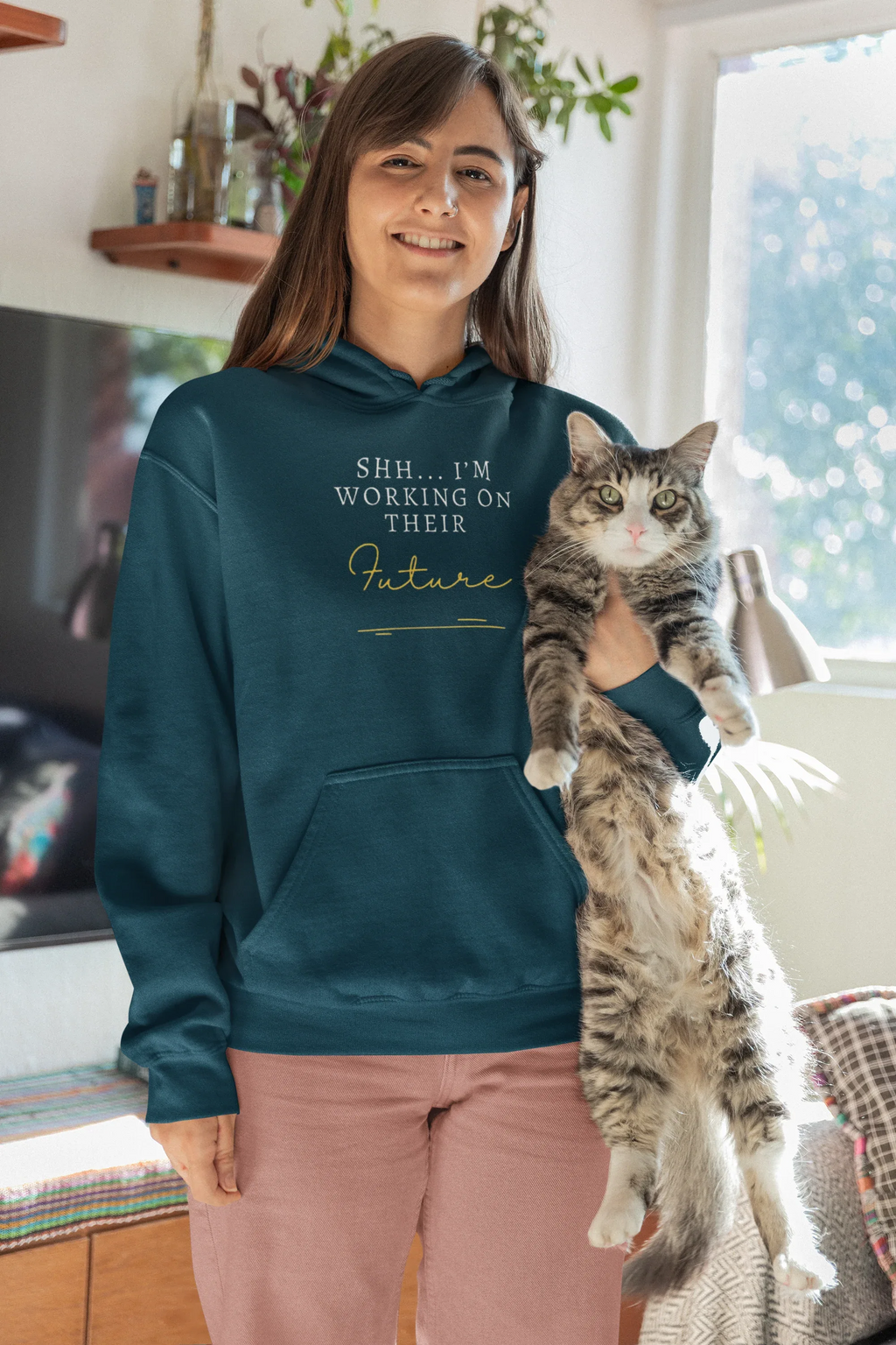 Teal hooded sweatshirt with kangaroo pocket and 'Future' graphic