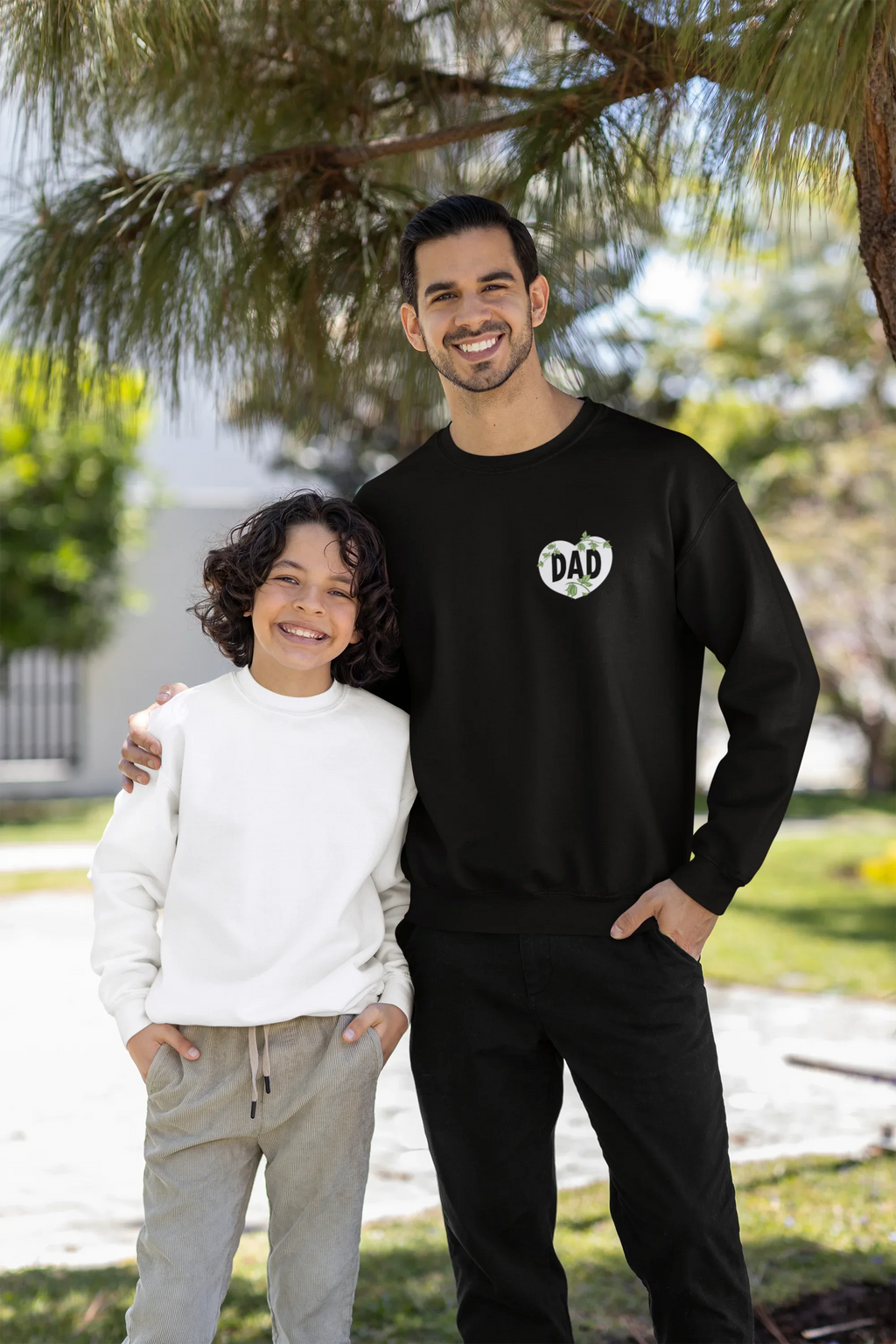 Black sweatshirt with small DAD heart logo on chest