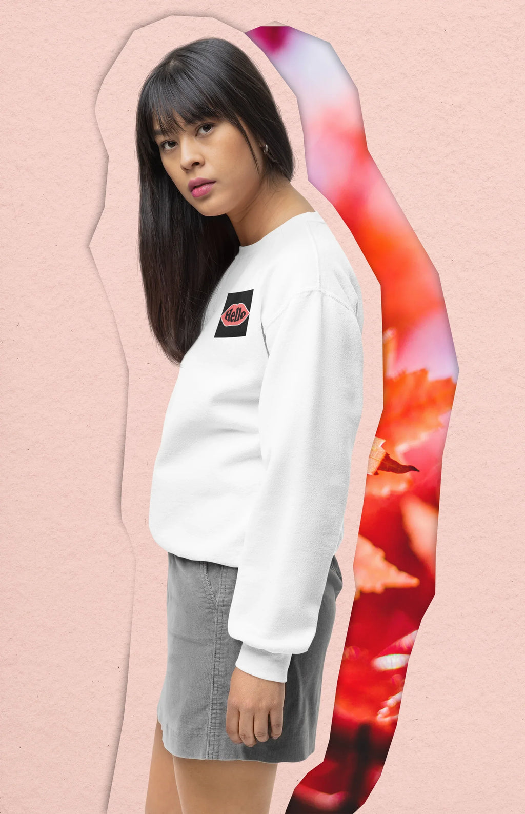 White crewneck sweatshirt with embroidered lip logo patch on left sleeve area.