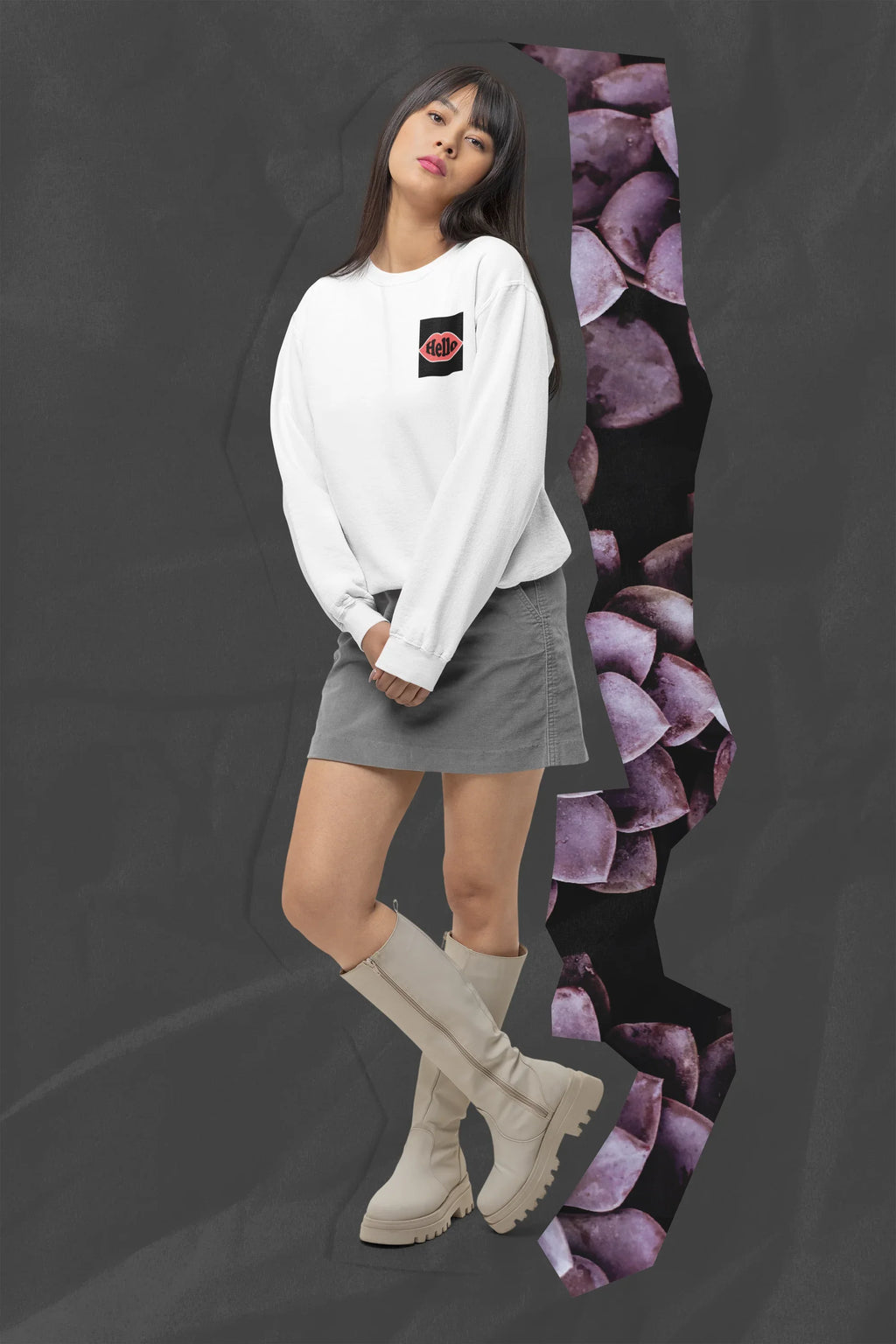 White crewneck sweatshirt with embroidered lip logo patch on the left chest.