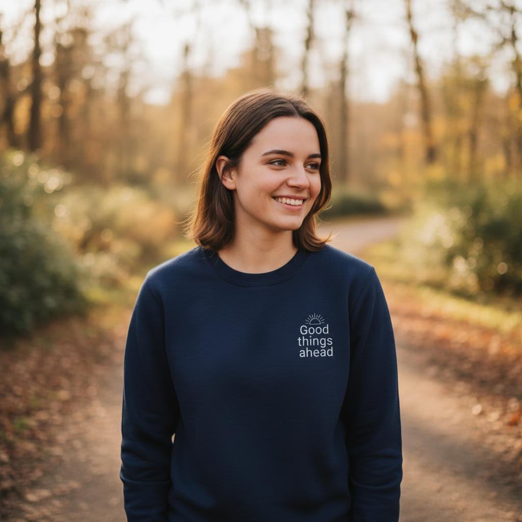 Navy crewneck sweatshirt with small chest logo