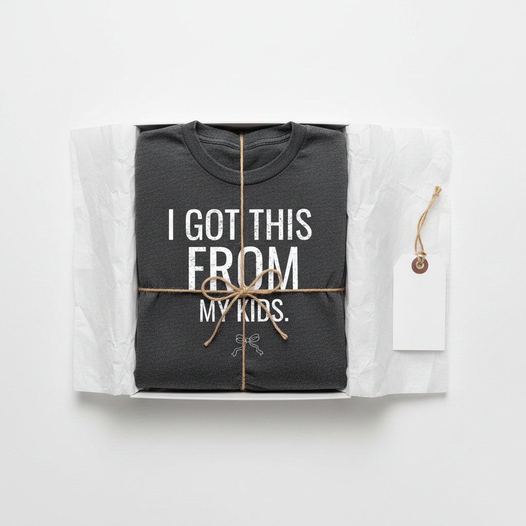 Dark graphite crew-neck T-shirt, folded, with "I GOT THIS FROM MY KIDS" text