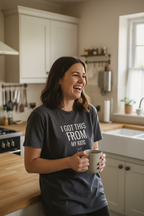 Dark grey crew-neck T-shirt with "I GOT THIS FROM MY KIDS" text, holding coffee