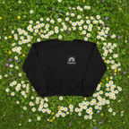 Black crewneck sweatshirt with embroidered rainbow arch and name patch reading “sophie”