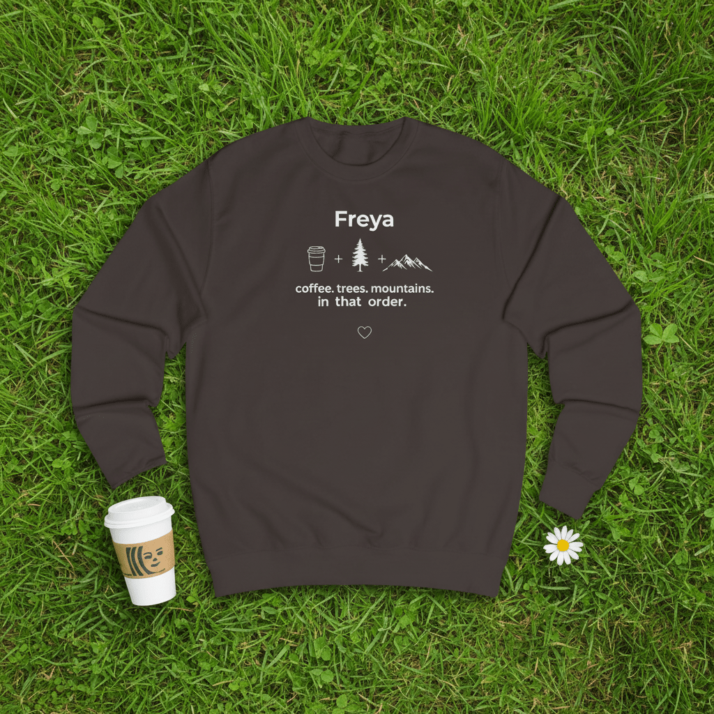 Dark brown crewneck sweatshirt with name “Freya” and coffee, trees, mountains graphic.