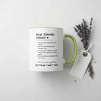 White ceramic mug with green handle and printed friendship quote with names.