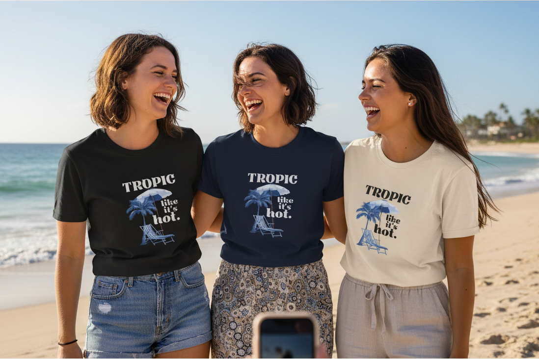Tropic Like It's Hot T-shirts on three people in black, navy, and cream with blue palm graphics