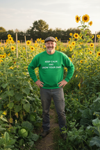 Green crewneck sweatshirt with printed slogan “KEEP CALM AND GROW YOUR OWN”