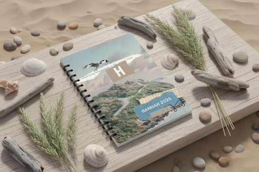 HANNAH 2026 coastal notebook at angle with natural elements