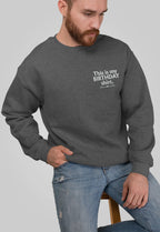 Charcoal gray crewneck birthday sweatshirt with printed “This is my BIRTHDAY shirt”