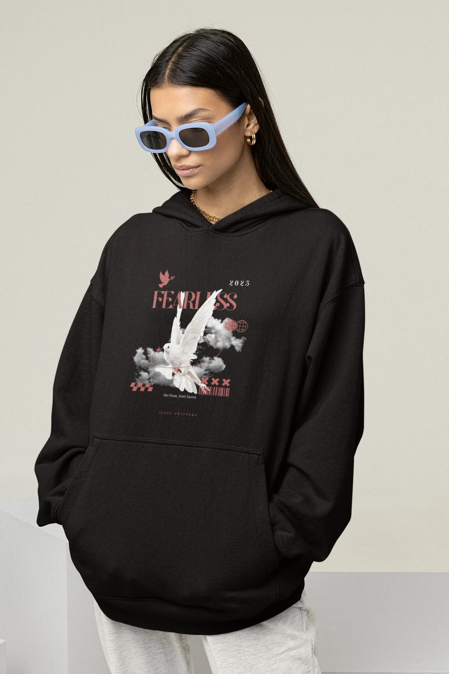 Black unisex hoodie with hood, chest graphic, and kangaroo pocket