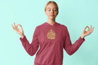 Burgundy unisex hoodie with front pocket and chest graphic