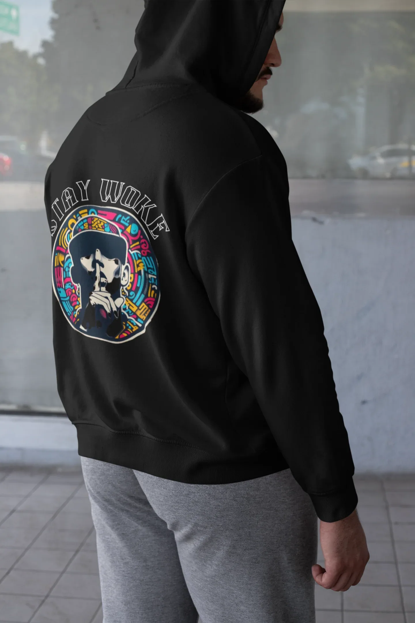 Black hooded sweatshirt with circular back graphic and relaxed fit