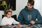 Teal hoodie with “DAD: THE MAN, THE MYTH, THE LEGEND” graphic on the chest