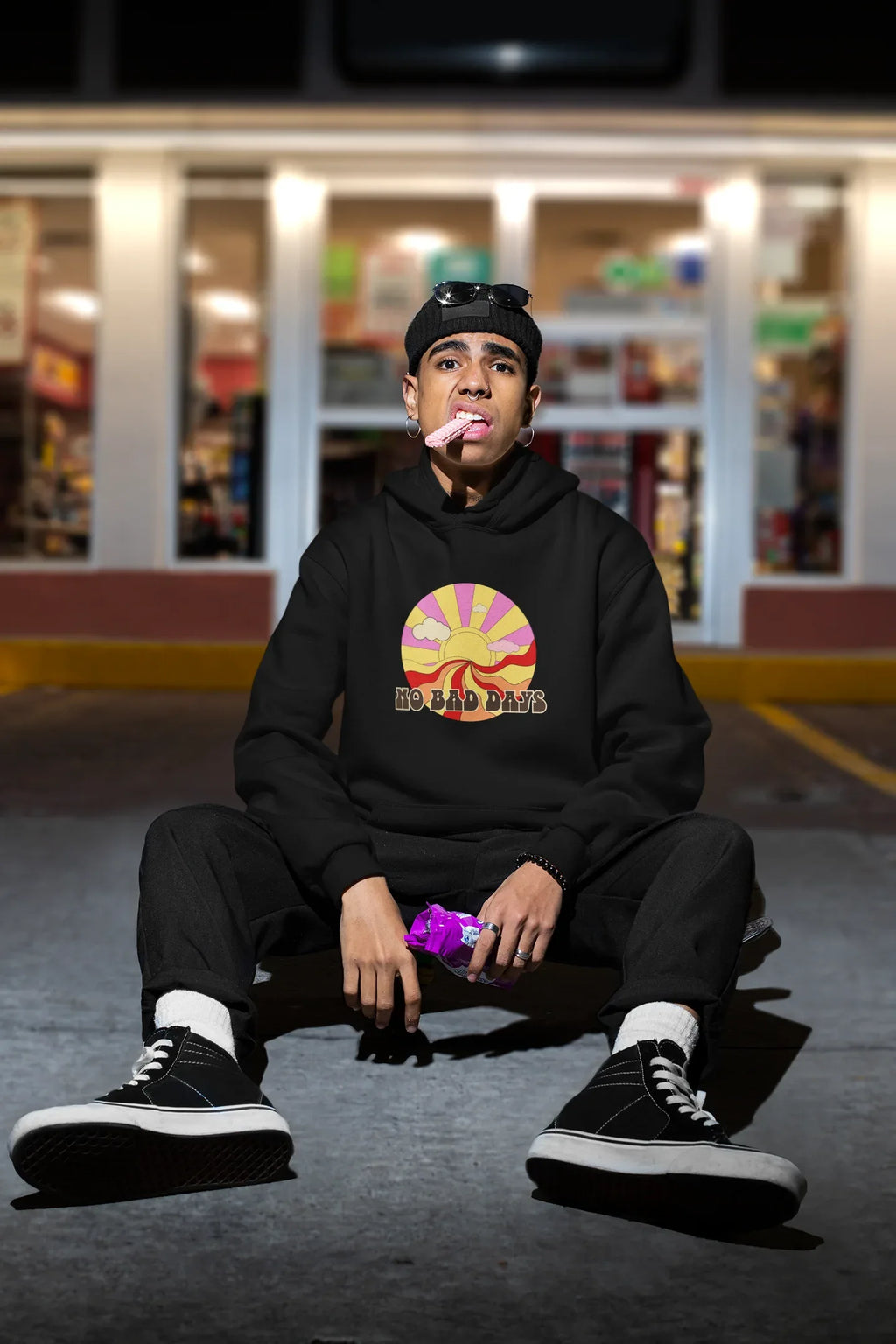 Black unisex hooded sweatshirt with colorful sun graphic and front kangaroo pocket