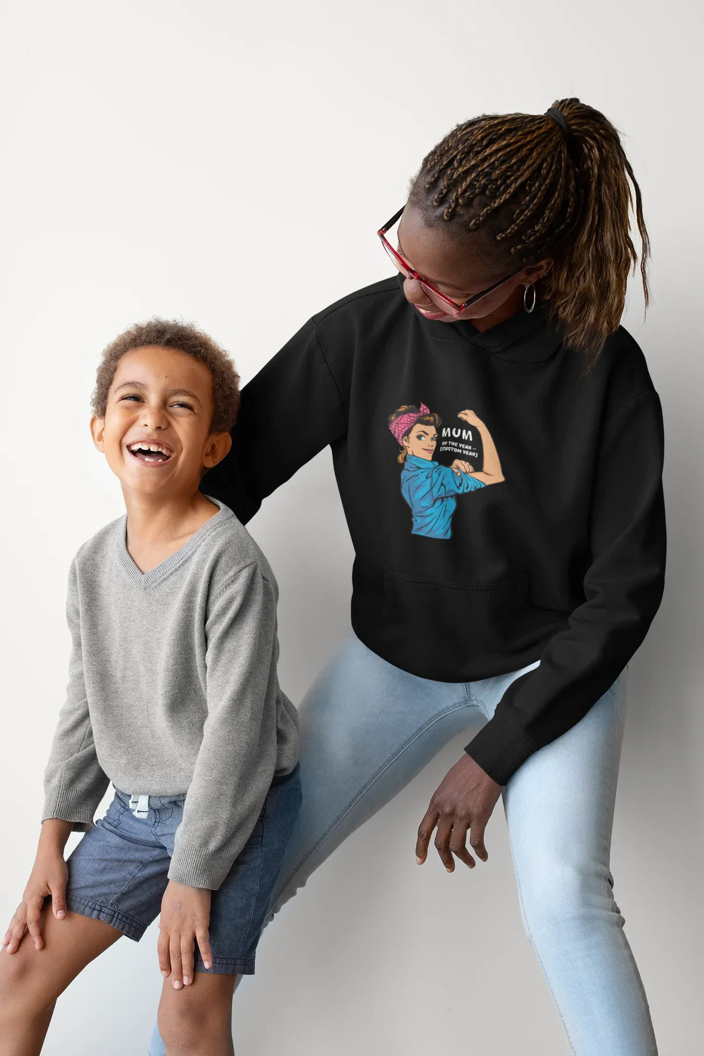 Black Mum of the Year hoodie sweatshirt worn by adult, featuring front graphic print