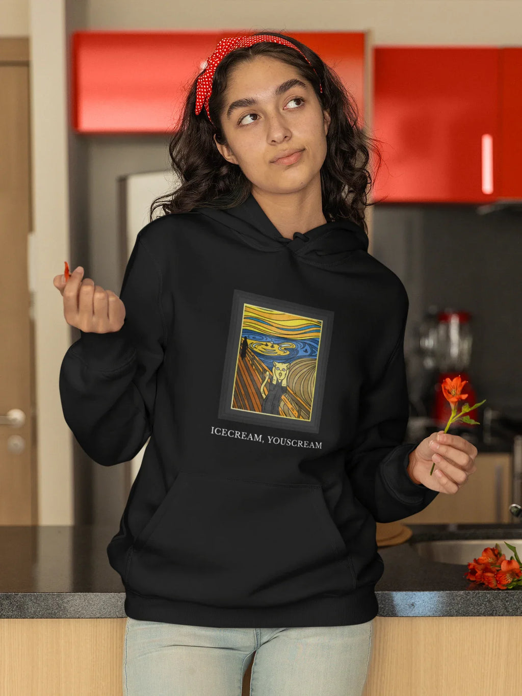 Black pullover hoodie with hood, chest colorful square graphic print and ICECREAM text.