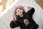 Black hoodie with cat-and-art graphic print on chest area