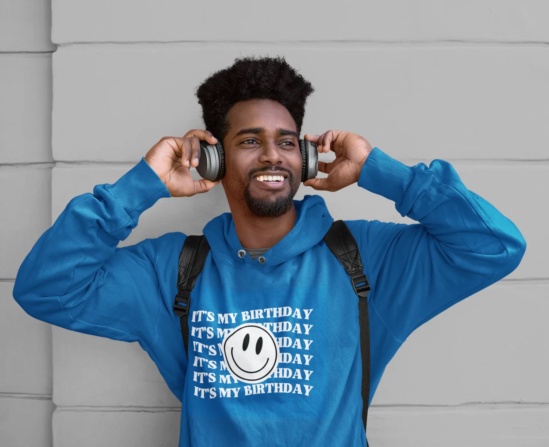 Blue pullover hoodie with 'It's my birthday' text and smiley face graphic