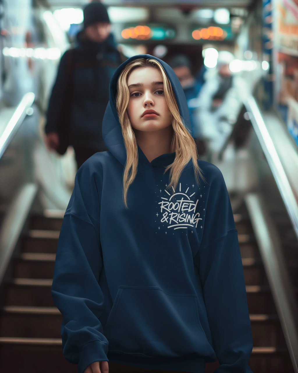 Navy hoodie with front pocket and hood, Rooted & Rising logo on chest