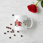 White coffee mug with red cup graphic and black text: I love you more than coffee.