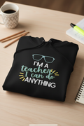 Black unisex hoodie with front pouch and colorful teacher slogan graphic