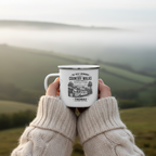 Personalised enamel camping mug with Thomas name — Country Walks design, UGC outdoor shot held in hands on misty hillside