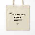 Natural canvas tote bag with 'Honeymoon loading..' text, progress bar and heart