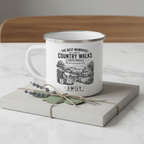Personalised enamel camping mug with Emily name — Country Walks design, gift-wrapped in kraft paper with twine on white marble surface